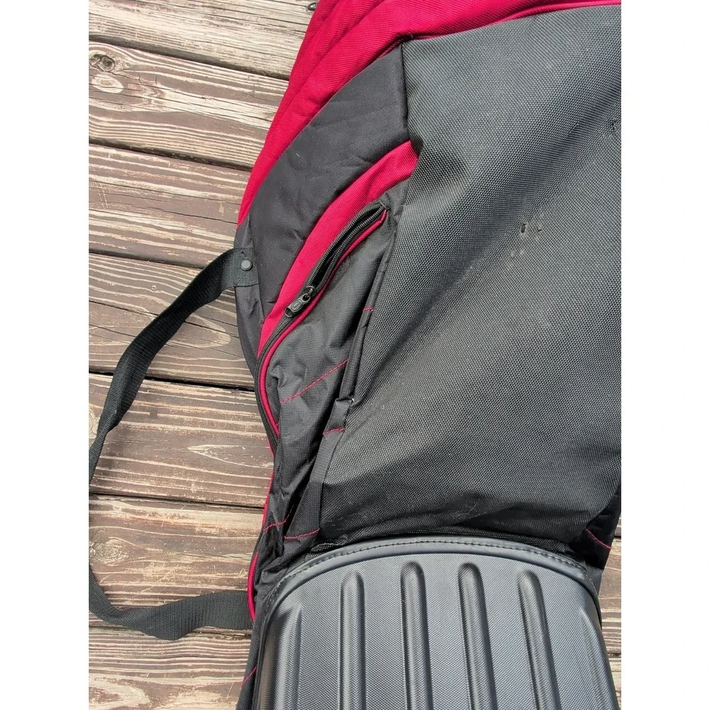 Used Bag Boy Golf Travel Case With Pivot Grip & Wheels - Black and Red